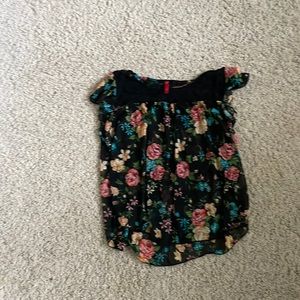 Women’s flutter sleeve baby doll top. Sheer black floral, lace yoke